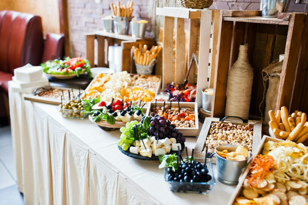 Great variety of different multicolored snacks on the wedding buffet.